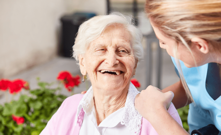 a happy elderly Living Independently with In-Home Care support